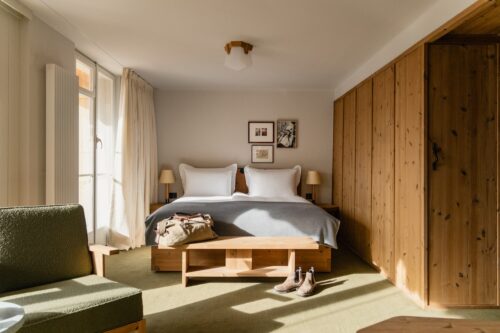 Hotel room with wood paneling at the Grand Hotel Belvedere in Wengen