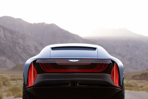 Head on view oCadillac Elevated Velocity oncept in Vapor Blue with the desert in the background. presented a monterey car week 2025