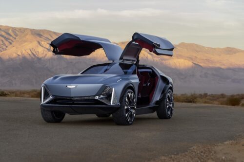 Head on view oCadillac Elevated Velocity oncept in Vapor Blue with the desert in the background. presented a monterey car week 2025