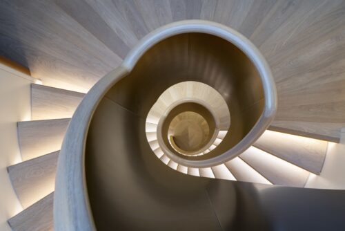 Interior and staircase of the M/Y ULTRA G by Heesen Yachts, 60-meter aluminum luxury superyacht reaching 37 knots.