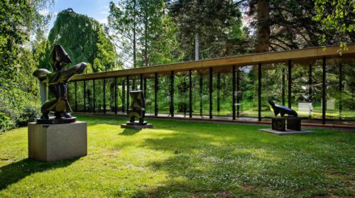 Louisiana Museum of Modern Art by Jørgen Bo and Vilhelm Wohlert: modern Danish architecture with glass façades, sculpture garden, and views of the Øresund.