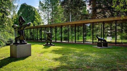 Louisiana Museum of Modern Art by Jørgen Bo and Vilhelm Wohlert: modern Danish architecture with glass façades, sculpture garden, and views of the Øresund.