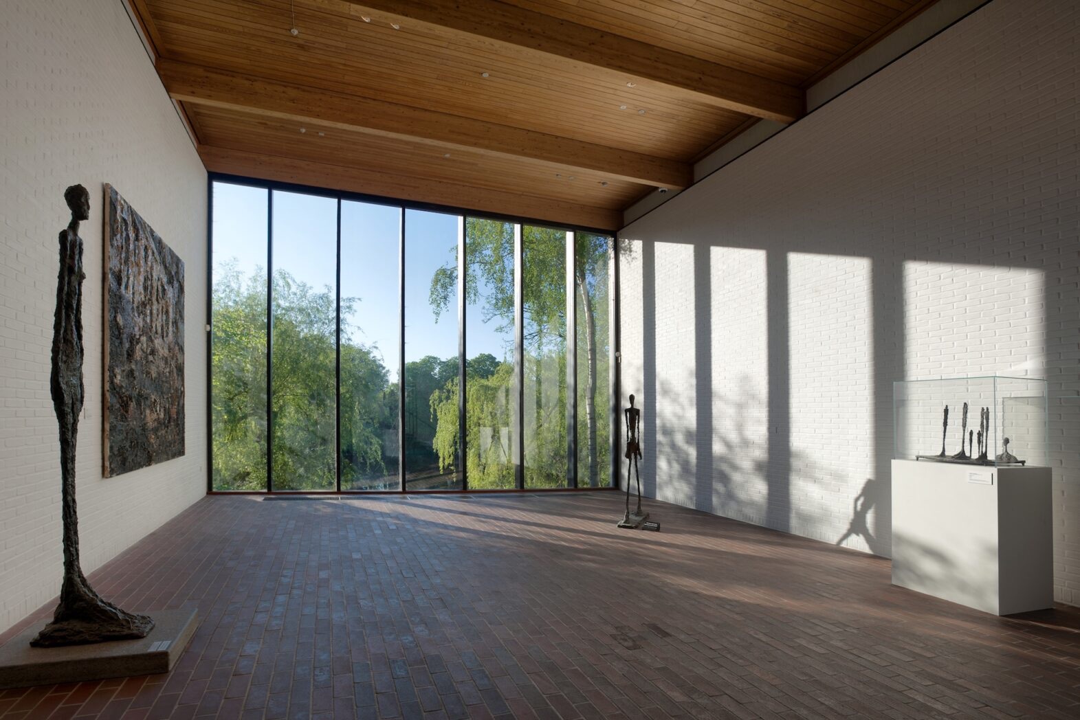 Louisiana Museum of Modern Art by Jørgen Bo and Vilhelm Wohlert: modern Danish architecture with glass façades, sculpture garden, and views of the Øresund.