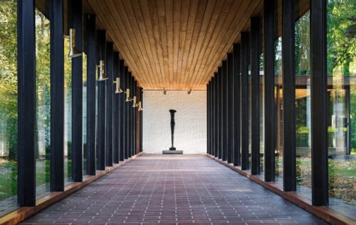 Louisiana Museum of Modern Art by Jørgen Bo and Vilhelm Wohlert: modern Danish architecture with glass façades, sculpture garden, and views of the Øresund.