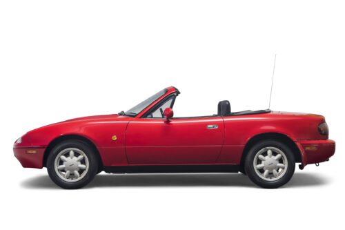 Red Mazda MX-5 first generation side view