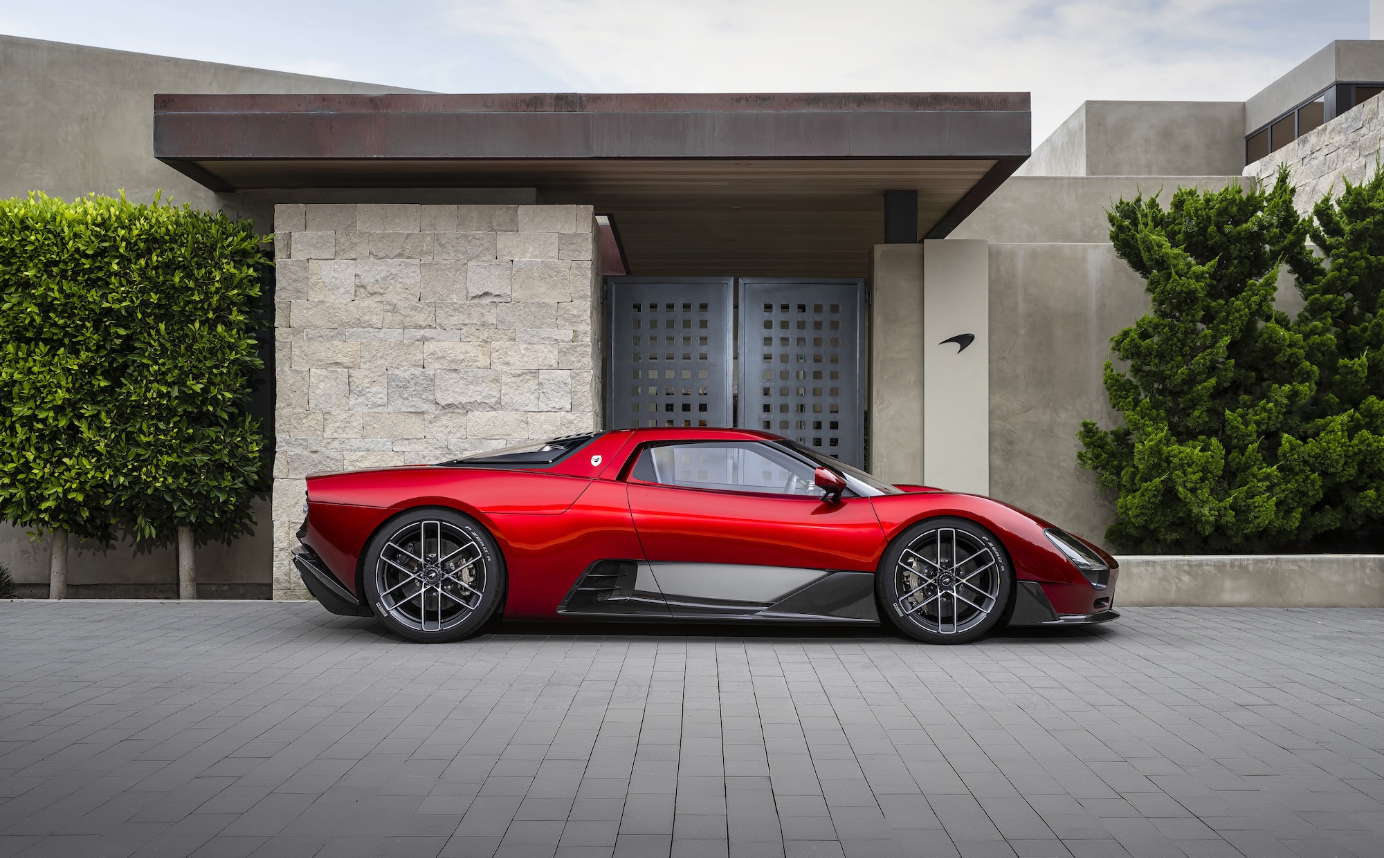 Red McLaren McL 6GT Concept at monterey car week 2026 pebble beach